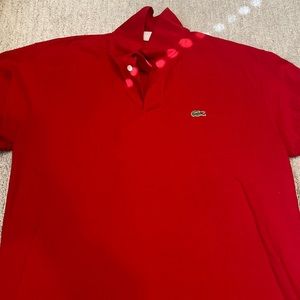 Red Lacoste shirt